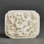 A Rare White Jade 'Dragon' Plaque, Yuan Dynasty (1279-1368), 元 白玉高浮透雕穿花龙纹蹀躞, 3 x 3.7 x 0.8 in — 7.5