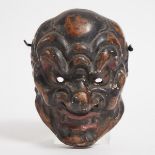 A Lacquered Wood Gigaku Mask of Konron, Edo/Meiji Period, 19th Century, height 9.4 in — 24 cm