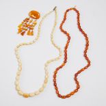 An Ivory Beaded Necklace, Together With an Amber Beaded Necklace and Brooch, 琥珀及牙雕珠宝一组三件, longest le