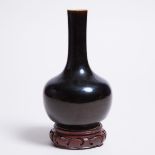 A Small Mirror-Black-Glazed Bottle Vase, 19th Century, 清 光绪时期 乌金釉小瓶, height 8.4 in — 21.3 cm