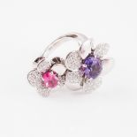 French 18k White Gold Cocktail Ring, formed as a twin blossom and set with an oval cut amethyst and