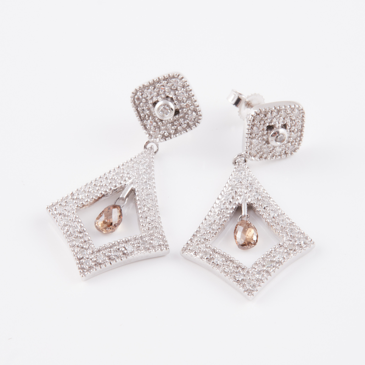 Pair Of 14k White Gold Drop Earrings, set with 2 briolette cut champagne diamonds, and numerous smal