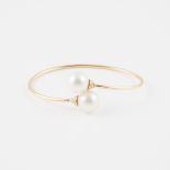 18k Yellow Gold Crossover Bangle, set with 2 South Sea pearls (11.6mm to 11.8mm), and 42 small brill
