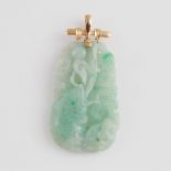 Carved Jadeite Pendant, with a 14k yellow gold mount