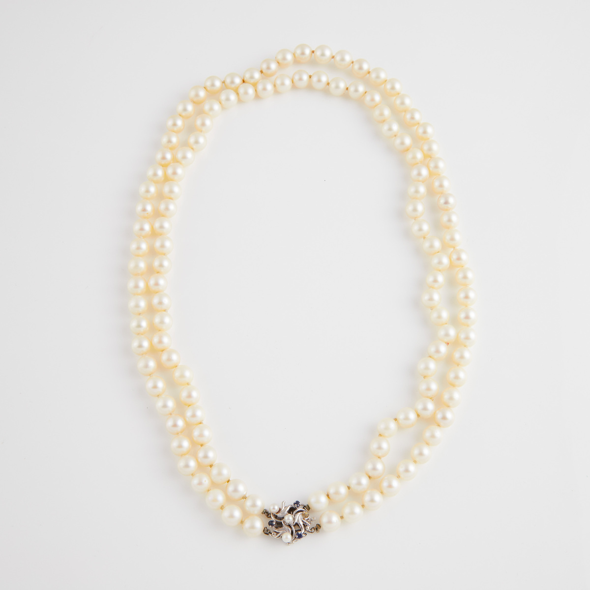 Double Strand Cultured Pearl Necklace, (8.8mm to 9.2mm) completed with a 14k white gold clasp set wi
