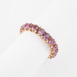 14k Yellow Gold Link Bracelet, set with 19 oval cut amethysts (approx. 10.0mm x 8.0mm) and 38 seed p