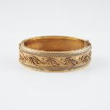 Mid-19th Century Carlo Giuliano 14k Yellow Gold Hinged Bangle, with applied gold decoration in the E