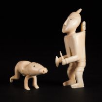 Unidentified Artist, PAIR OF TUPILAQS, ivory, largest 4.75 x 2 x 1.5 in — 12.1 x 5.1 x 3.8 cm