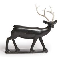 Osuitok Ipeelee ᐅᓱᐃᑐ ᐃᐱᓕ, RCA (1923-2005), STRIDING CARIBOU, stone, antler, 13.25 x 14 x 2.75 in — 3