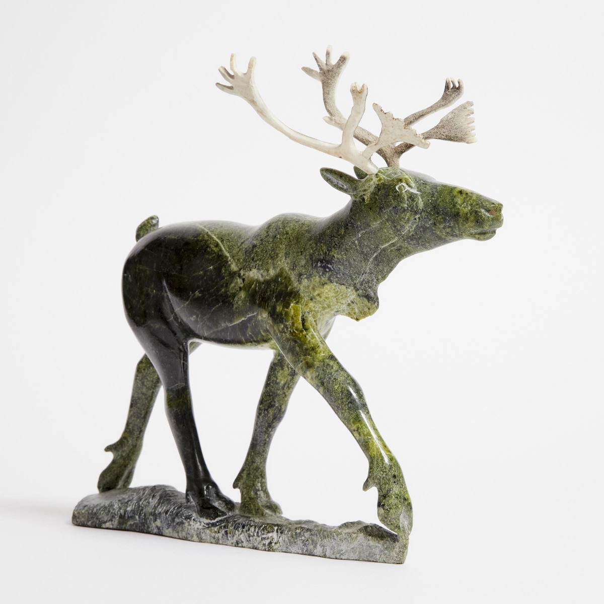 Henry Evaluardjuk ᐃᕙᓗᐊᔪ (1932-2007), STRIDING CARIBOU, 1978, stone, antler, 10.25 x 12.5 x 2.25 in — - Image 3 of 7