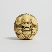 An Ivory Netsuke of a Shishi Ball, Mid to Late 19th Century, diameter 1.4 in — 3.6 cm