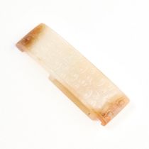 A White and Russet Jade Scabbard Slide, Han Dynasty (206 BC-AD 220), 汉 白玉剑璏, length 3.4 in — 8.6 cm