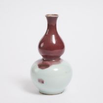 A Copper-Red Splashed Double-Gourd Vase, 18th Century, 清 十八世纪 红釉葫芦瓶, height 8.5 in — 21.6 cm