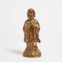 A Gilt Lacquered Bronze Figure of a Luohan, Ming Dynasty (1368-1644), 明 漆金罗汉, height 7.6 in — 19.4 c