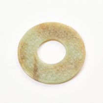 A Celadon Jade Bi Disc, Warring States Period (475-221 BC), 战国 青玉勾云纹璧, diameter 2.1 in — 5.4 cm