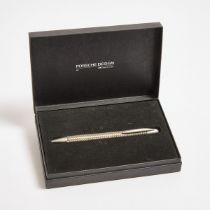 Porsche Design By Faber-Castell Ballpoint Pen, in a woven steel and gold-plated body with 'push' ope