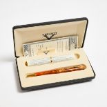 Visconti Kaleido Ballpoint Pen, in a marbled orange resin body; with the original box and papers