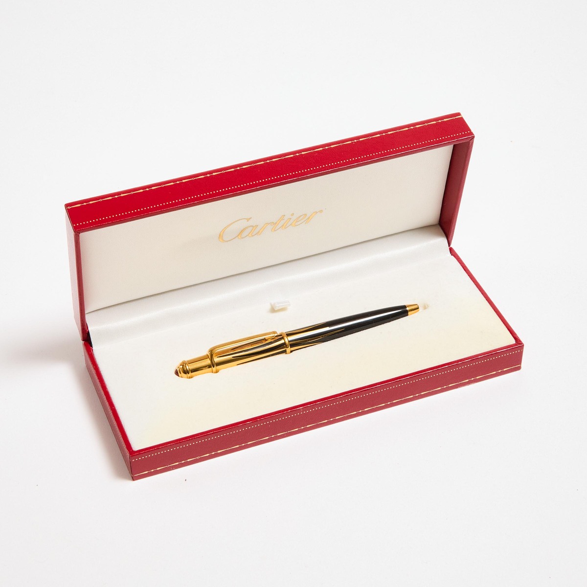 Cartier Mini Diablo Ballpoint Pen, #074456; in a gold-plated and black resin body, topped with a syn
