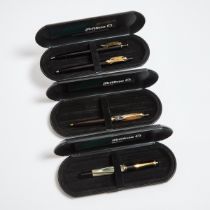 Group Of Four Pelikan Pens, comprising a K400 ballpoint in a brown resin body; a fountain pen (5.0")