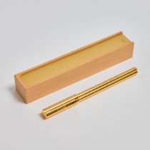 Bulgari Ballpoint Pen, in a gold-plated barrel and cap, with extra refill; in a wooden box