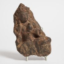 Indian Grey Schist Fragment Figure of a Seated Deity Holding a Book, 12th-13th century, 7 x 4 x 2.75