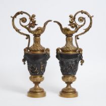 Pair of Large Victorian Renaissance Revival Patinated and Gilt Bronze Ewers, 19th century, height 26