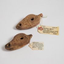 Two Egyptian Terracotta Oil lamp each with Mask of Hathor, Roman Period, c.300 B.C., each length 4 i