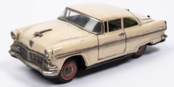 A Japanese Asahi Toy Tinplate 2-door Sedan. A 1950s Ford Fairlane type car, in cream with red wheels