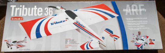 A Horizon Hobby Hanger 9 Tribute 36 ARF radio controlled aircraft with 1133mm wingspan. Body in wood