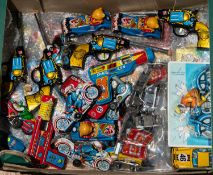 A quantity of Small Tinplate Vehicles and other items. Vehicles include Police, Fire, Ambulance,