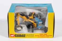A Corgi Toys Ford Super Major Tractor with Hydraulic Scoop (74). Tractor in blue with yellow arm and