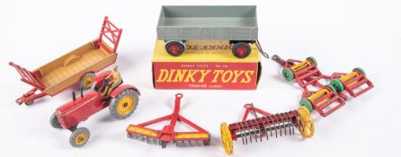6 Dinky Toys. Massey Harris Tractor (300). Halesowen Farm Trailer (320). Triple Gang Mower (323).