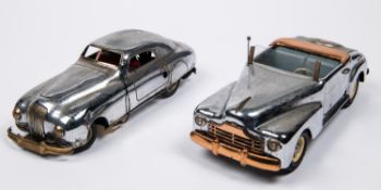 2 Italian produced plated tinplate clockwork musical cars. A 1950's Buick style 2 seat open