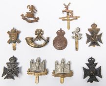 Eleven various cap badges: small cast KRRC officers, CLB Cadets KRRC, Huntingdonshire Cyclists or