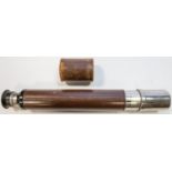 A single draw telescope by Ross, London, number 93664, with bright nickel plated body and leather