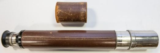 A single draw telescope by Ross, London, number 93664, with bright nickel plated body and leather