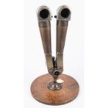 A German Third Reich period "donkey ear" prismatic periscope binocular, of heavy bronze, steel and