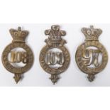 Three pre 1881 brass glengarry badges of the 97th, 100th and 108th Regiments, with copper lugs top
