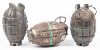 An inert No 36 Mk I practice hand grenade ("Mills bomb"), the body has had the drilled holes