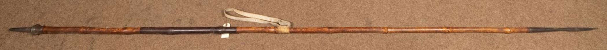 A 19th century bamboo cavalry lance, 108" (9') overall, the shoe bearing ordnance marks "9.L",