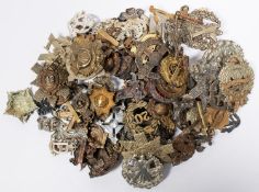 Approximately 80 restrike cap badges, including Cavalry, Yeomanry, Infantry etc. GC £60-80