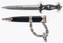 A good copy of a Third Reich 1936 pattern SS dagger, no maker's mark, in its black painted sheath