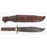 A large Bowie knife, clipped back blade 10", the hilt with recurved brass crossguard and staghorn