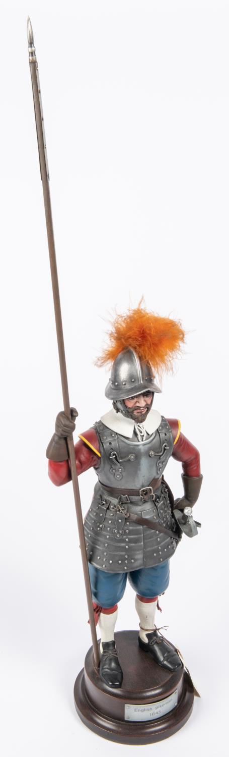 A decorated figure of a Cromwellian pikeman c 1645, with applied armour and weapons, mounted on a