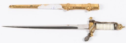 A miniature Imperial German Naval dagger letter opener, plain plated blade 5", with white plastic