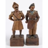 A most unusual pair of carved wood figures: The Two Types, the famous WWII cartoon army officers,