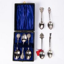 A set of three EPNS Kynoch rifle prize spoons, 115mm, each depicting lion's head left at handle