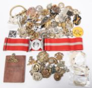 Approximately 2½ lbs (1.2kg) weight of military cap badges, trade badges, a few collar badges,