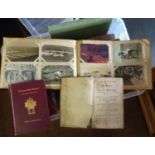 A collection of postcards, cigarette cards and books. A postcard album of early 20th Century