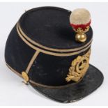 An 1869 pattern officer's shako of the 89th Regiment, blue cloth with gilt lace piping, original